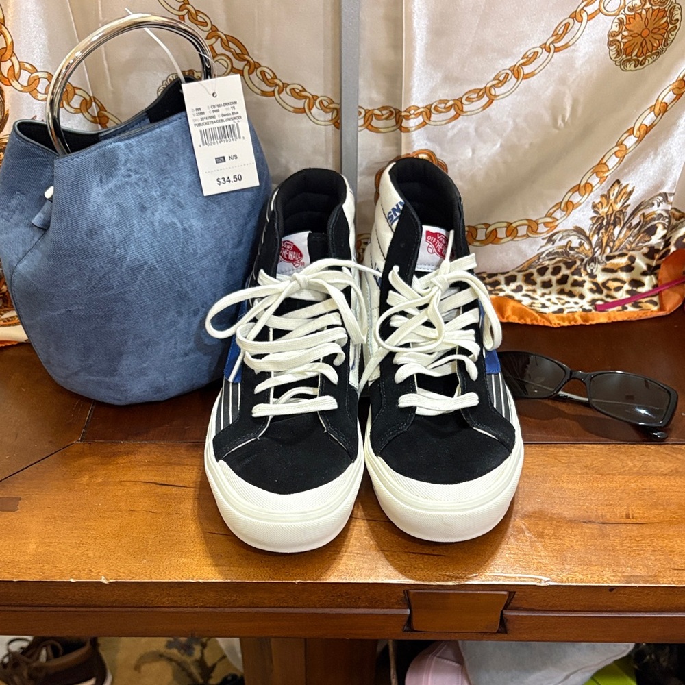 Vans Black and White High-Top Sneakers, Denim bag and shades.
